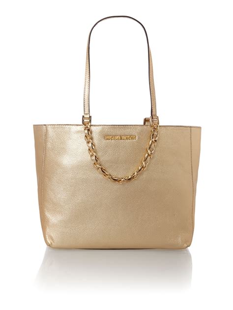 michael kors oat gold purse|Michael Kors gold tote handbags.